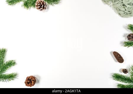 Christmas winter composition. Christmas pine cones, fir branches on white background. Flat lay, top view, copy space Stock Photo