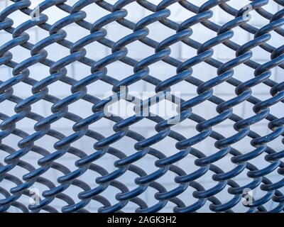 rubber coated chain link fence background Stock Photo