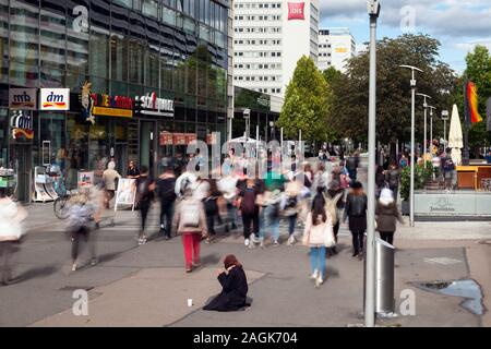 Beggars in the pedestrian zone Prager Strasse in the city center of Dresden Stock Photo