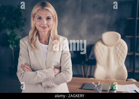 Close up photo of smart intelligent middle aged businesswoman feel independent real boss big enterprise leader cross hands ready give seminar training Stock Photo