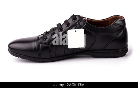 The Black leather boot with label on white Stock Photo