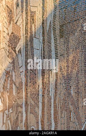 A shallow depth of field photograph of a tiled wall displaying a mural at downtown Ann Arbor, Michigan. Stock Photo