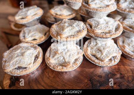 Delicious home made artisan mince pies on sale at a Christmas market. Stock Photo