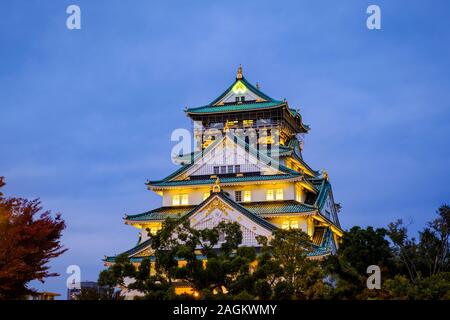 Osaka, Japan - November 10, 2019 : View of Osaka Castle Lit Up at Night Stock Photo