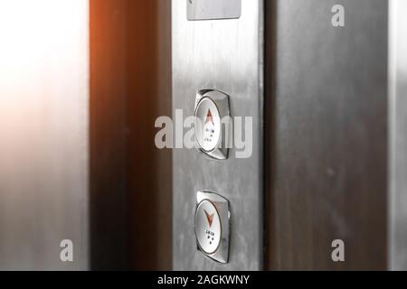 Elevator call buttons. selective focus, shallow depth of field Stock Photo