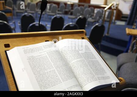 An open Torah presented on a lectern ready for a service Stock Photo