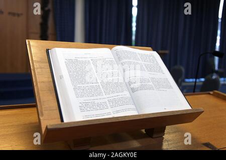 An open Torah presented on Jewish altar "Bimah" Stock Photo