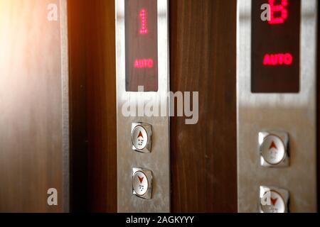 Elevator call buttons. selective focus, shallow depth of field Stock Photo