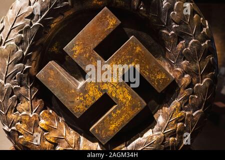 England, London, Lambeth, Imperial War Museum, Exhibit of Bronze German Swastika Recovered from The Ruins of The Reich Chancellery in Berlin Stock Photo