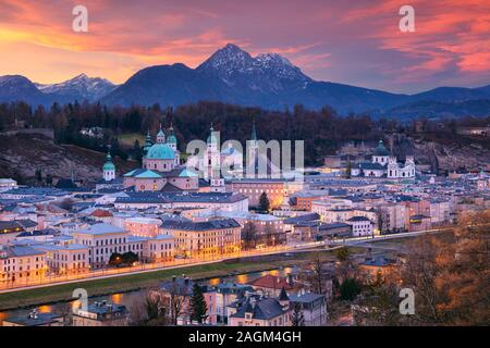 Salzburg, Austria. Cityscape image of the Salzburg, Austria with Salzburg Cathedral during beautiful winter sunset. Stock Photo