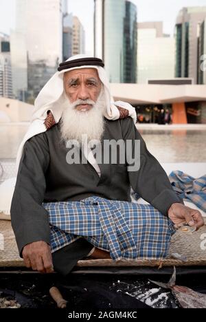 Abu Dhabi, 14th Deceber 2019: fisherman showing off perls he found in an oyster Stock Photo