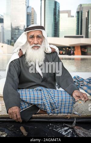 Abu Dhabi, 14th Deceber 2019: fisherman showing off perls he found in an oyster Stock Photo