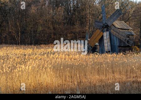 Autumn panorama with windmills on lake, Astra Museum of Traditional Folk Civilization, Sibiu city, Romania Stock Photo