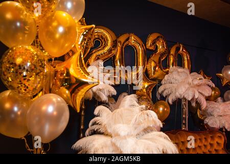 Crazy luxury corporate event decoration with feather and gold in Eastern Europe Latvia Riga bar cafe restaurant Stock Photo