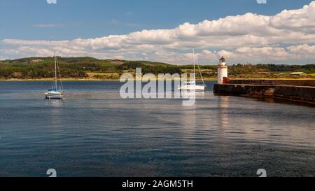 Argyll, Scotland, UK - June 3, 2011: Sailing yachts shelter in Ardrishaig Harbour on Loch Gilp in Argyll in the West Highlands of Scotland. Stock Photo