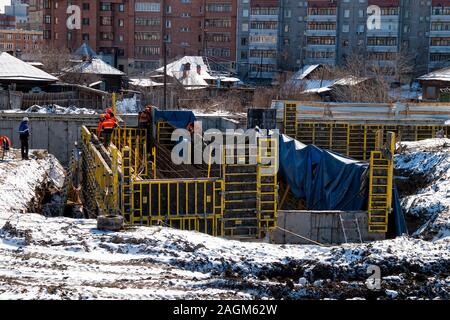 Workers construction of new bridge in Tyumen Stock Photo