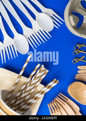 Eco-friendly biodegradable paper dishes on a blue background Stock Photo
