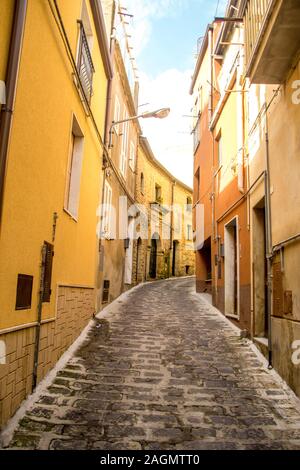 A look along a typical Italian alleyway, in Enna, Sicily. Stock Photo