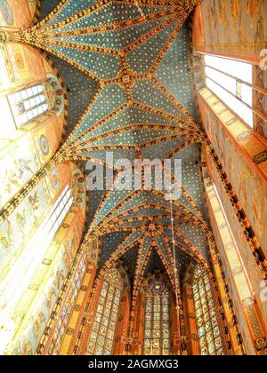 Beautiful architecture and interior of St. Mary's Basilica in the Central Square of Krakow, Poland. Stock Photo