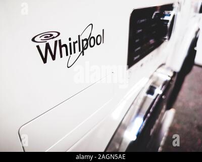 Close up to a Whirlpool brand logo on a white washing machine Stock Photo