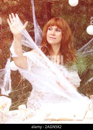 woman in the forest. fantasy image. Sorceress, cobweb of thread. Witch. Fairy tale Stock Photo