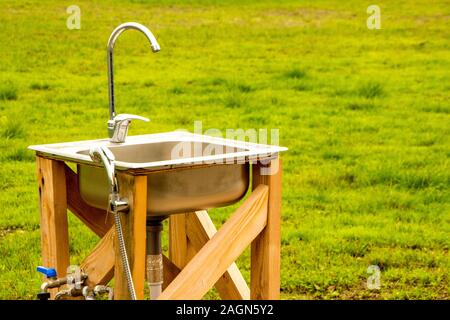 A makeshift outdoor sink. Stock Photo