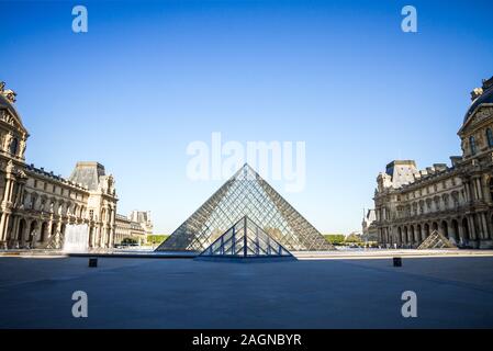 PARIS/FRANCE - September 10, 2019 : Louvre Museum and Pyramid Stock Photo