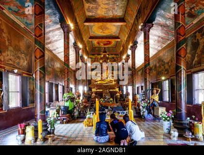 The Colourful Interior Of Wat Phnom Buddhist Temple, Phnom Penh, Cambodia. Stock Photo