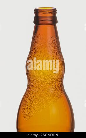 Empty glass bottles that can be used for different drinks. Stock Photo