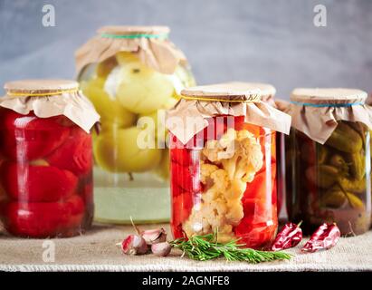 Various vegetables in a jar prepared for home canning Stock Photo