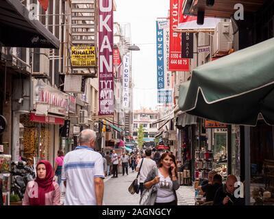 Istanbul , Turkey ; October 2019 : Long-shot of crowded local street people walking normal day Stock Photo