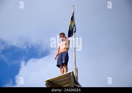 NEGRIL, JAMAICA - Aug 05, 2016: Ricks Café, Negril, Jamaica – August 2016: David Colturi Red bull cliff diver jumping off platform Stock Photo