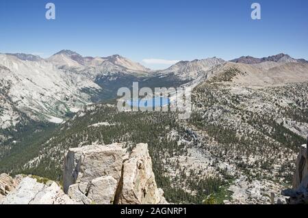 view from Arrow Peak over Bench Lake towards Taboose Pass and Striped Split and Cardinal Mountains Stock Photo