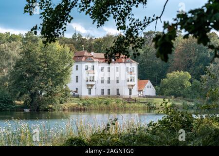 Berlin, Germany - september 26, 2019: View of castle Grunewald across the lake on a bright autumn day Stock Photo