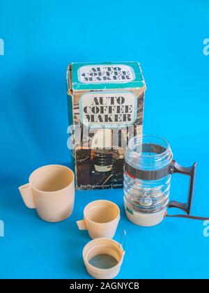 old 1970s 12 volt electric travel coffee maker made for a car picnic and motoring Stock Photo
