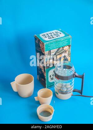 old 1970s 12 volt electric travel coffee maker made for a car picnic and motoring Stock Photo