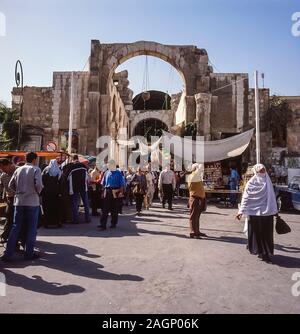 Syria. Pleasant street scenes in old Damascus as people go about their daily business at the city gates entrance to the suq and the old historic part of town Stock Photo