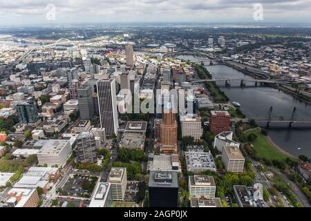 Aerial view of buildings, bridges, towers, streets and the Williamette River in downtown Portland, Oregon, USA. Stock Photo