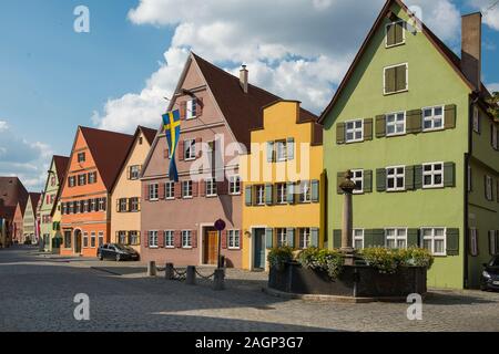 Dinkelsbühl, Bavaria, Germany - July 15, 2019; Colorful houses in a street in Dinkelsbühl an touristic town on the romantic road Stock Photo