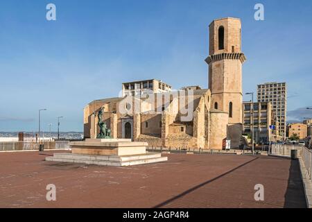 Marseille, France - November 1, 2019: Romanesque church of Saint-Laurent built in the 12th century of pink limestone, one of the oldest in Marseille, Stock Photo