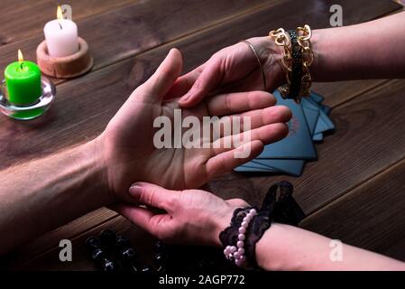 Witch - fortune teller reading fortune close up Stock Photo