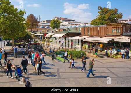 Istanbul, Turkey - September 19th 2019. Tourists and locals walk past the exterior part of the Egyptian Spice Bazaar, also known as Misir Carsisi, in Stock Photo