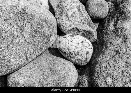 Rocks and stones in various sizes, shapes, and textures photographed in Sengamnon beach, Japan Stock Photo