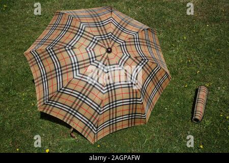 Vintage Burberry's Nova Check Automatic Folding Umbrella and Cover Stock Photo