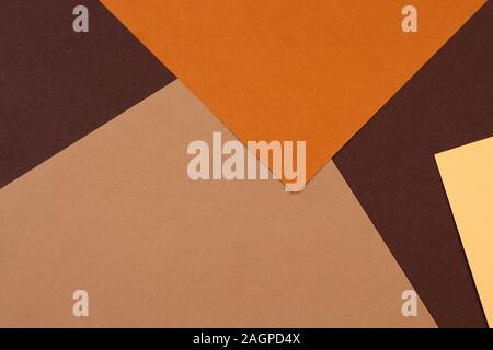 Abstract geometric paper background in earth tone. Many earth tones originate from clay earth pigments, such as umber, ochre, and sienna. Stock Photo