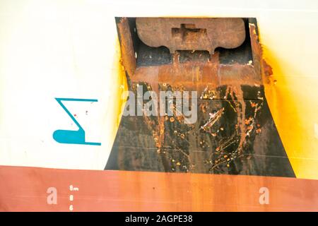 A huge anchor stowed away on a large cargo ship/ Stock Photo