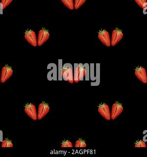 Strawberry seamless pattern. Berry pattern on black background. Top view. Original minimal food concept. Summer pattern. Stock Photo
