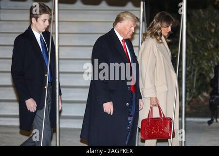 Washington DC, USA. 20th Dec, 2019. President Donald Trump, Melania Trump and his son Barron Trump walk on the South Lawn of the White House before boarding Marine One on December 20, 2019 in Washington, DC., for a trip to Andrews Air Force Base, Md., to deliver remarks at the signing ceremony for S.1790, the National Defense Authorization Act for Fiscal Year 2020 na then to Mar-A-Lago, Fl. (Photo by Oliver Contreras/SIPA USA) Credit: Sipa USA/Alamy Live News Stock Photo