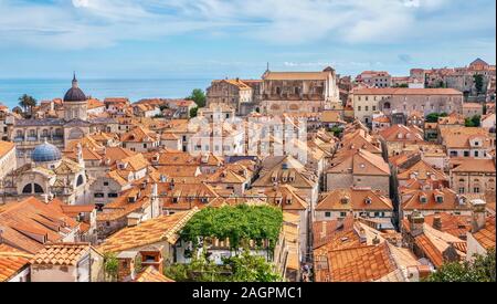 High angle view of the Old Town of Dubrovnik and its traditional stone buildings and orange tile roof tops. Stock Photo