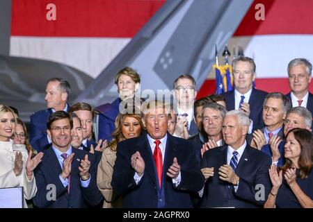 Washington, United States. 20th Dec, 2019. US President Donald Trump applauds after signing S.1790, the National Defense Authorization Act for Fiscal Year 2020 on December 20, 2019 at Joint Base Andrews in Suitland, Maryland. Photo by Alex Wroblewski/UPI Credit: UPI/Alamy Live News Stock Photo